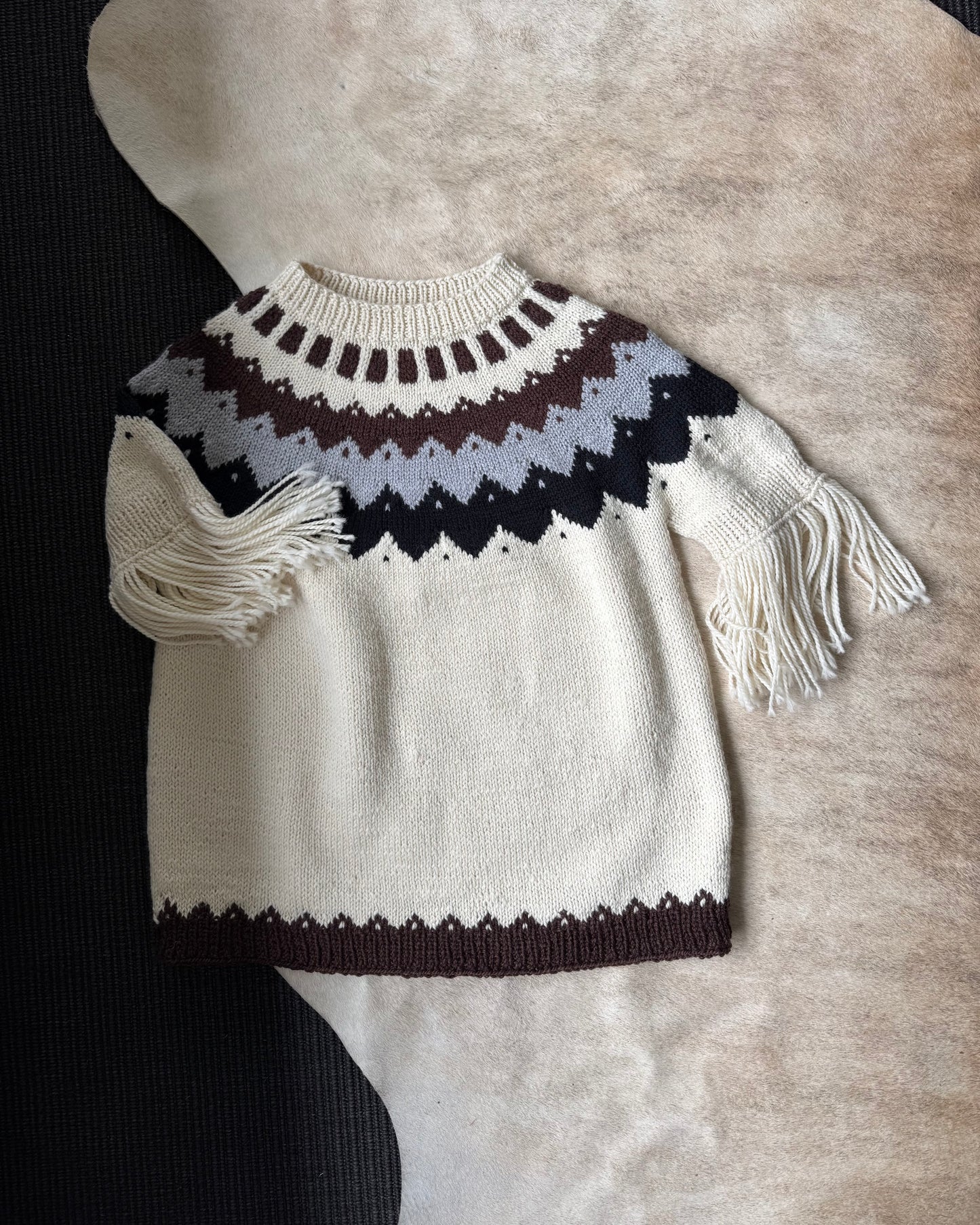 Sweater Patagonia flecos