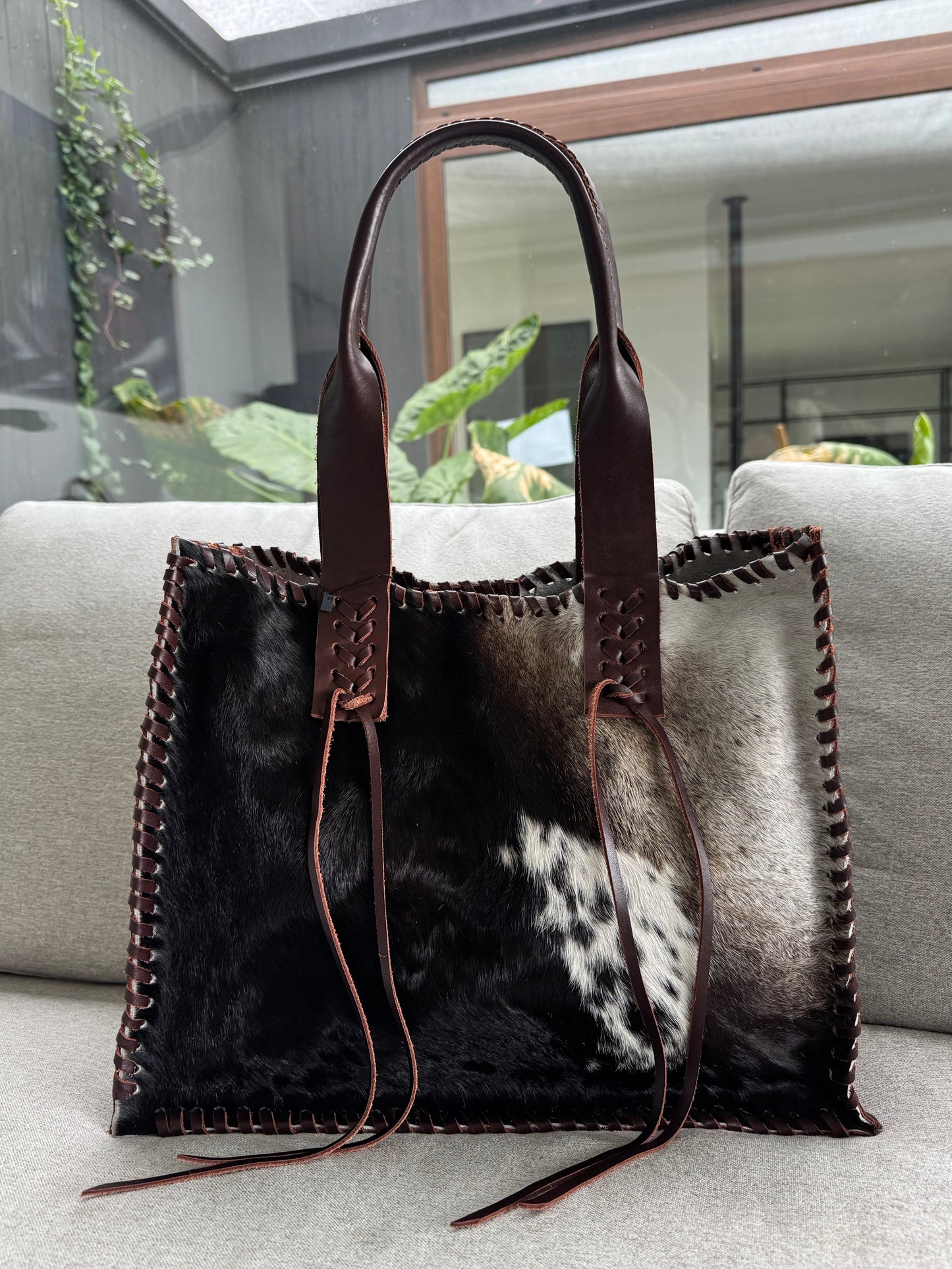 Cartera estancia moro pelo negro