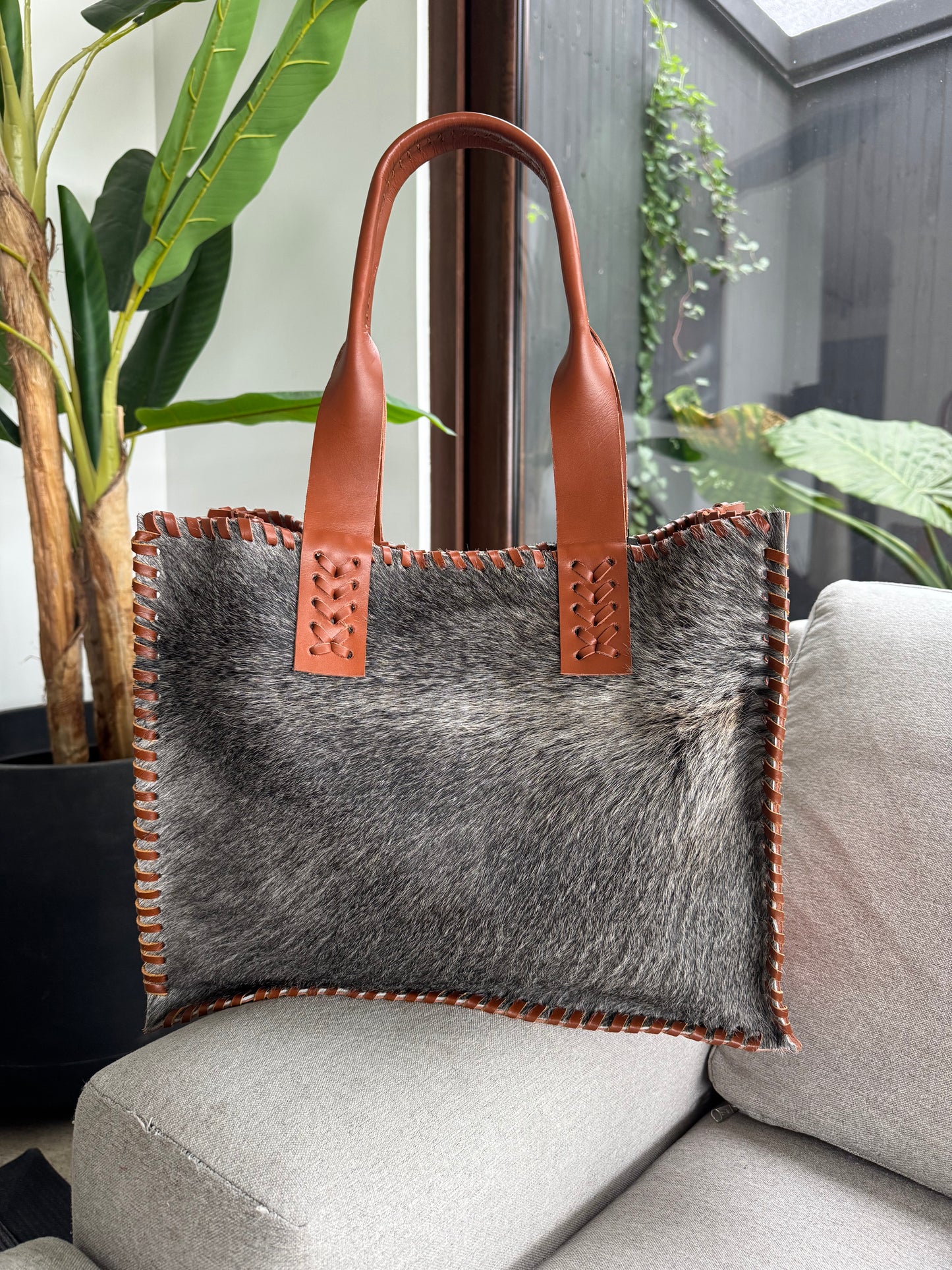 Cartera estancia camel pelo gris