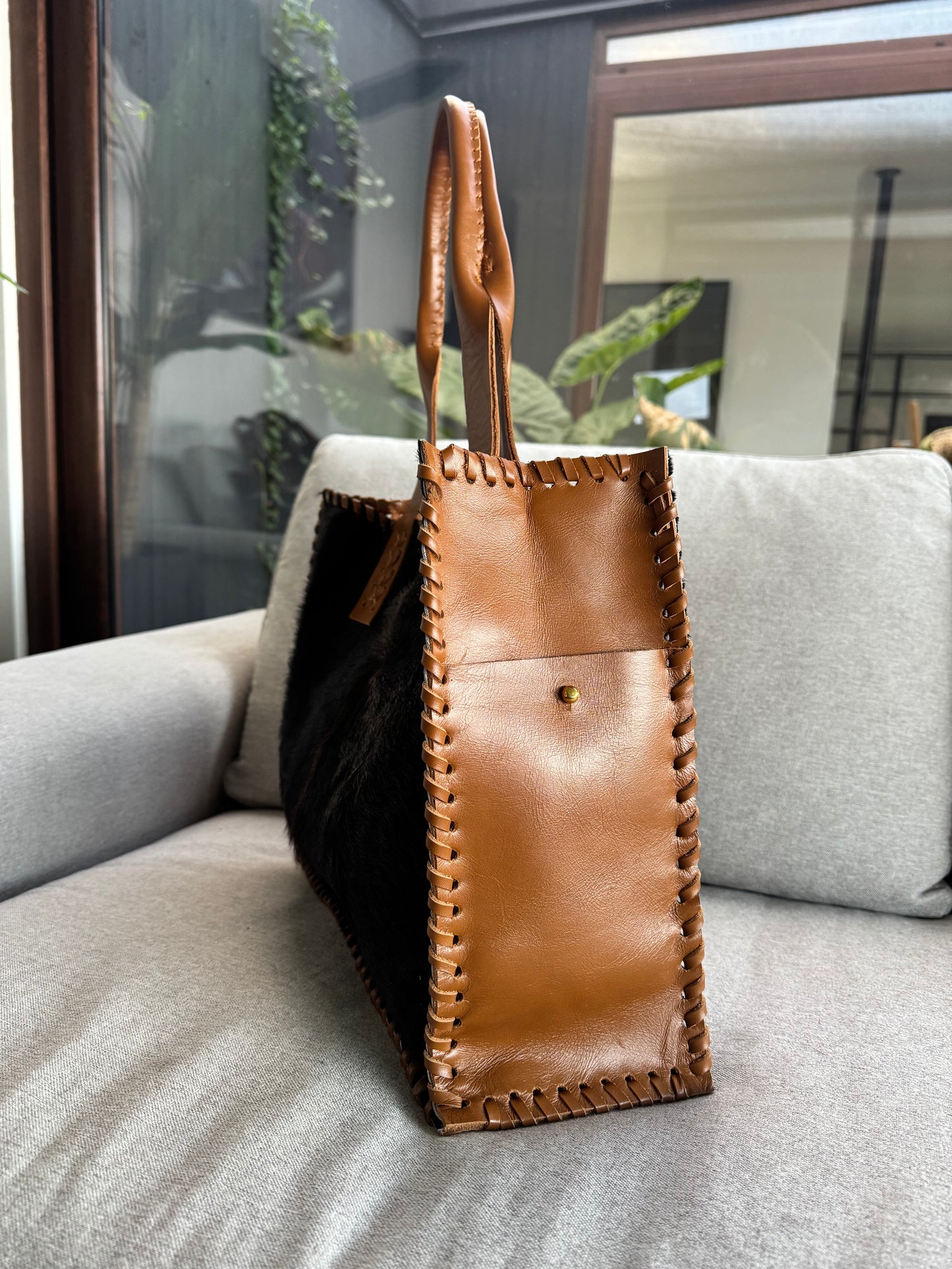 Cartera estancia curry pelo negro