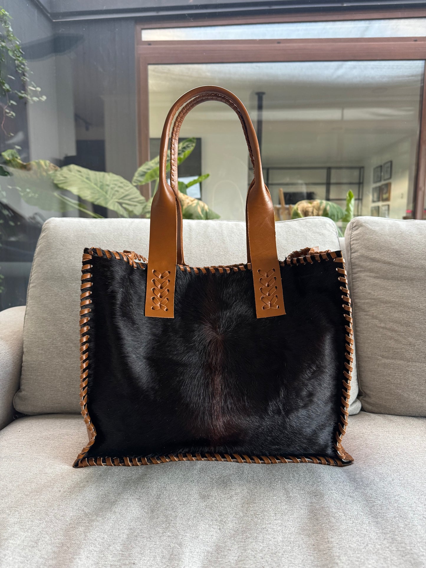 Cartera estancia curry pelo negro