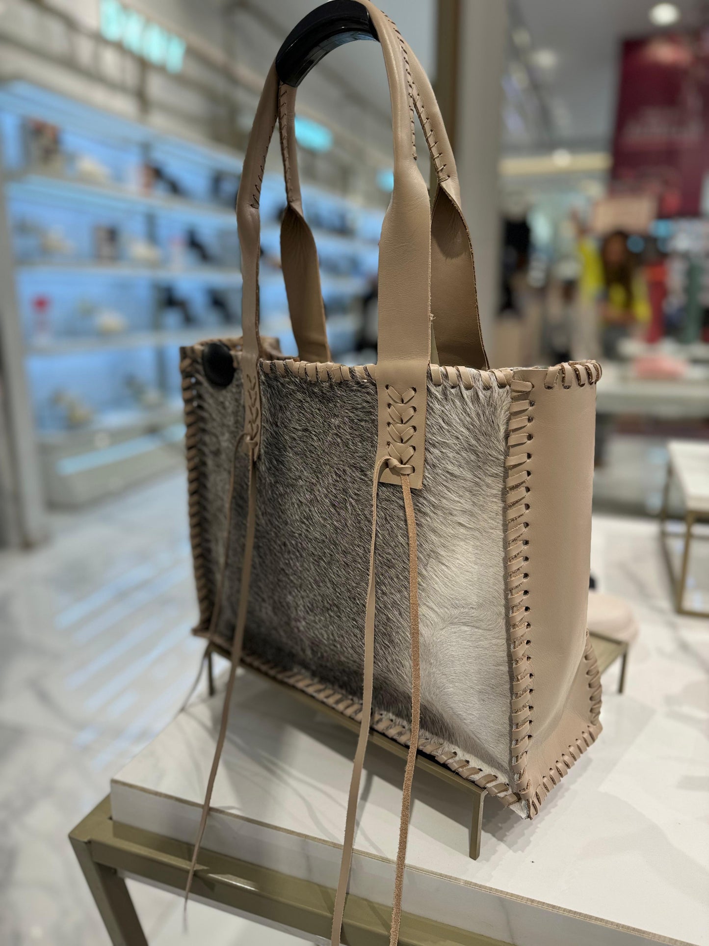 Cartera estancia nude pelo gris