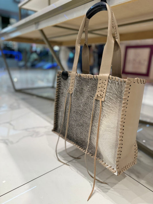 Cartera estancia nude pelo gris